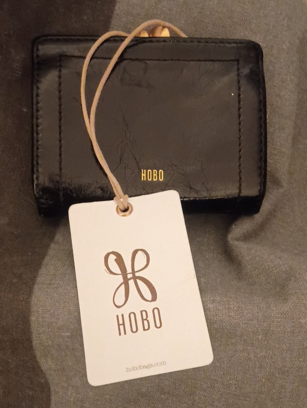 HOBO Black Leather Mini Wallet with Gold Logo